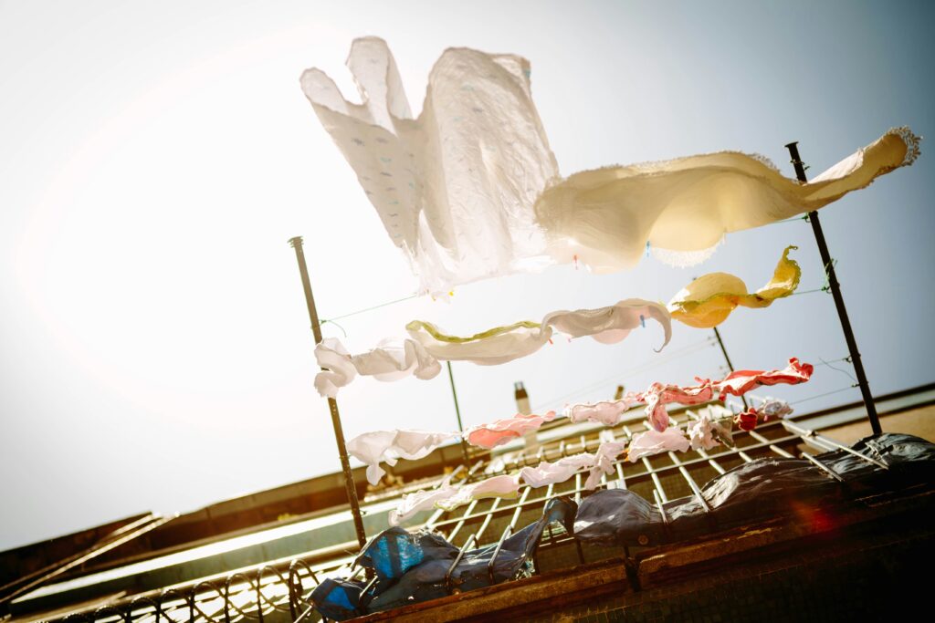 How to Get Fiberglass Out of Clothes covering contaminated clothing, safe handling, fiber removal, careful washing, laundry separation, and fabric protection.