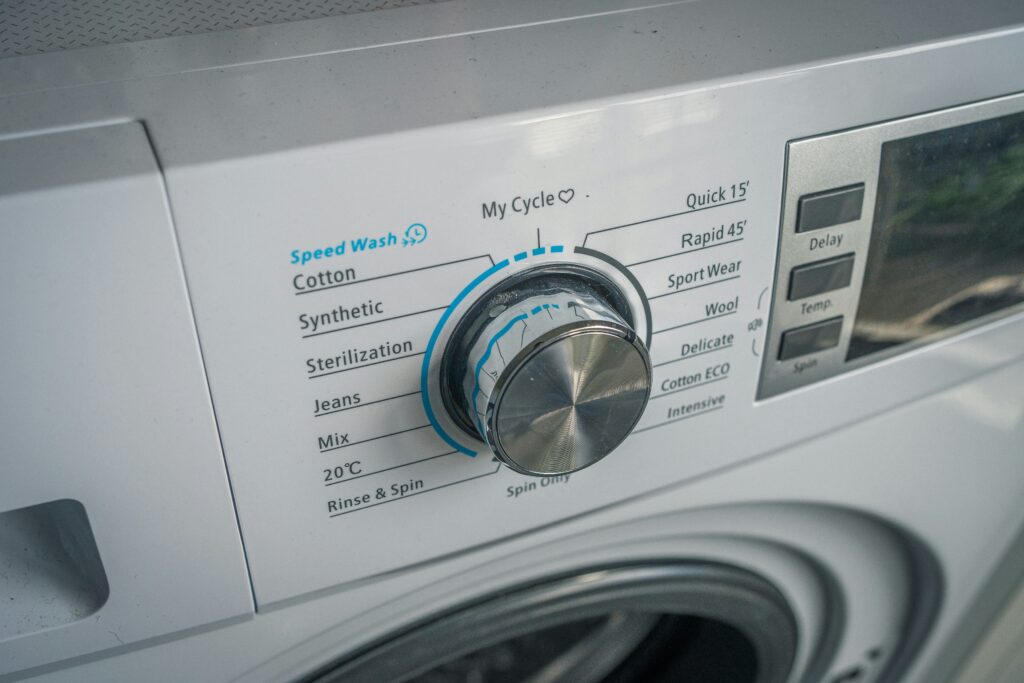 Why does my washing machine shake violently during spin cycle? Understanding washer balance, load issues, and possible fixes.