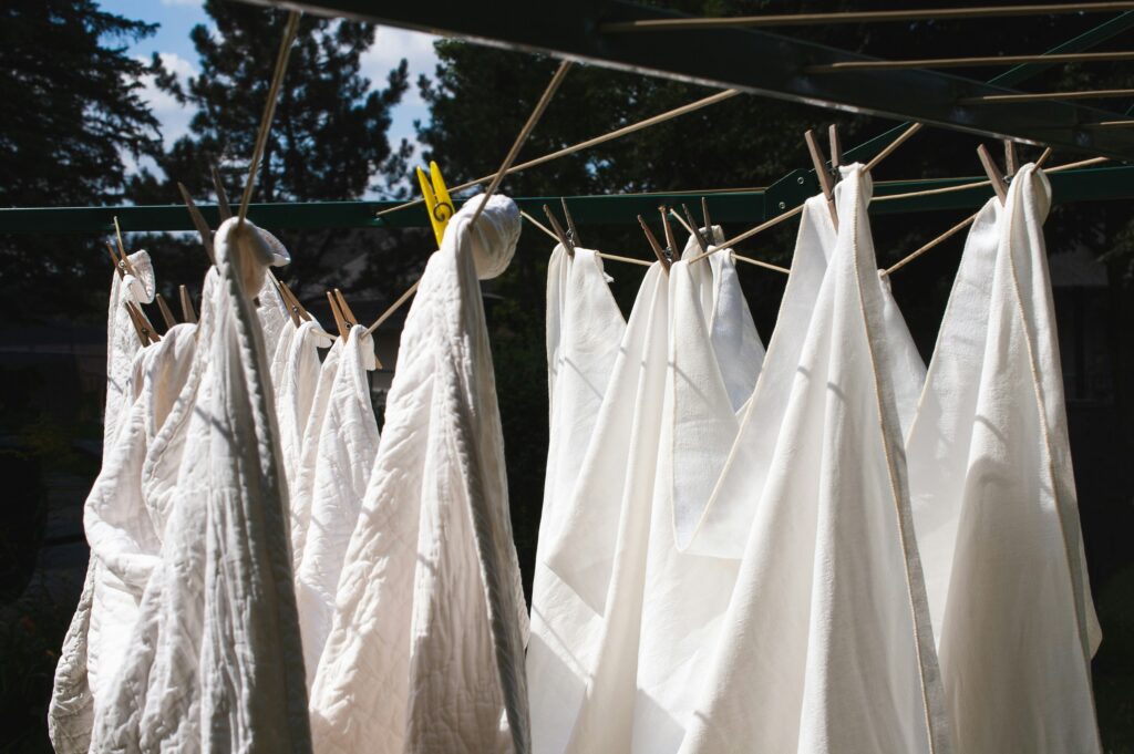 How to Get Cooking Oil Out of Clothes covering fresh oil spills, grease stain treatment, pretreatment, fabric-safe cleaners, washing, and clothing care.